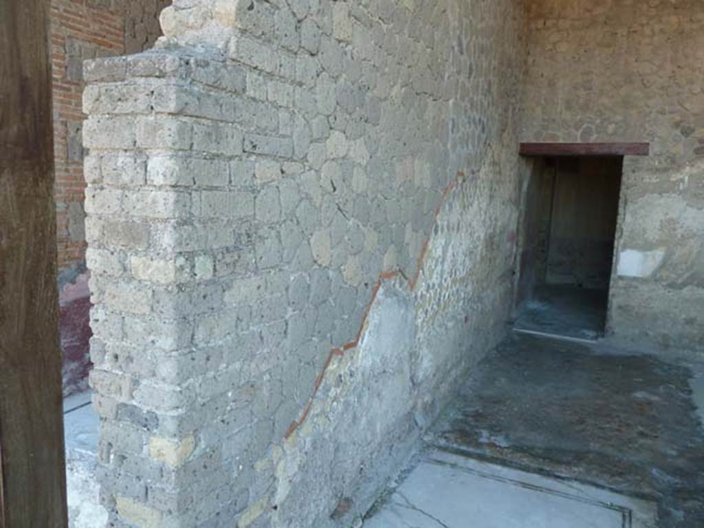 Villa San Marco, Stabiae, September 2015. Room 10, east wall with line of terracotta to differentiate between original wall and reconstructed wall.