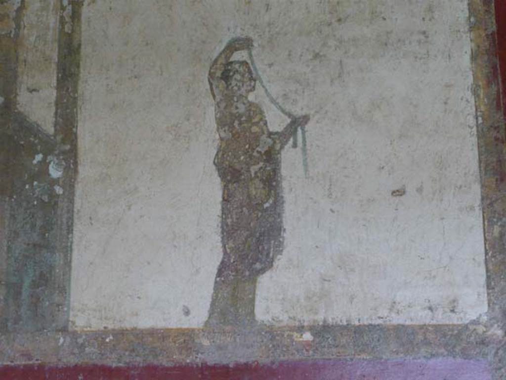 Villa San Marco, Stabiae, 2010. 
Room 8, south-west wall. detail of figure to left of doorway into room 13. Photo courtesy of Buzz Ferebee.
