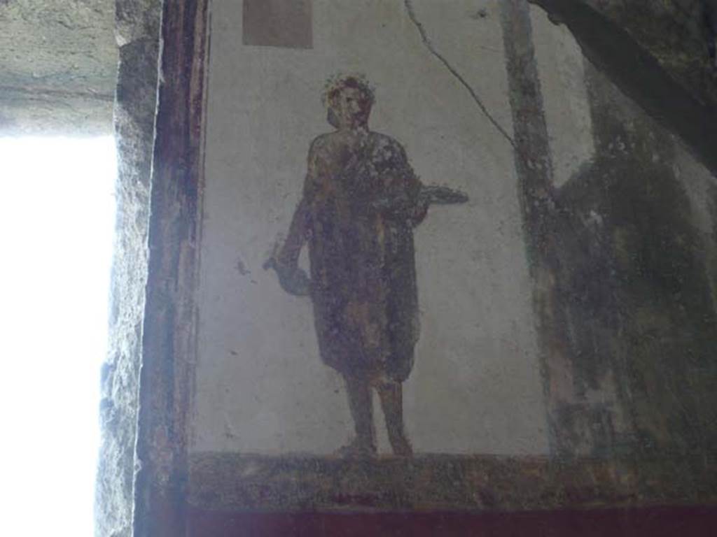 Villa San Marco, Stabiae, 2010. Room 8, east wall, detail of figure to right of window. Photo courtesy of Buzz Ferebee.
