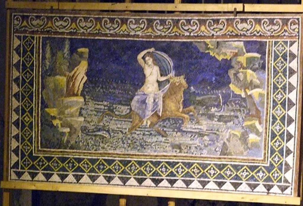 Villa San Marco, Stabiae, December 2006. Room 12, reproduction of mosaic Europa on the Bull.
This mosaic was discovered 23rd April 1752 in the nymphaeum at the south-east end of the peristyle pool.
The original is now in the Museo Conde de Chantilly, inventory number OA123, see Room 65.
See Pagano, M. and Prisciandaro, R., 2006. Studio sulle provenienze degli oggetti rinvenuti negli scavi borbonici del regno di Napoli. Naples: Nicola Longobardi. (p. 239)
