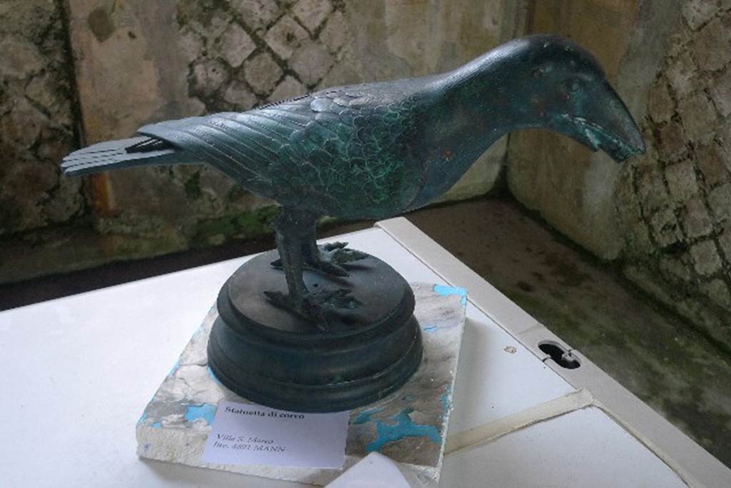 Castellammare di Stabia, Villa San Marco, July 2010. Room 12.
Reproduction of bronze crow found and reported on 17th July 1751, during the Bourbon excavations. Photo courtesy of Michael Binns. The original is in the Naples Archaeological Museum. Inventory number 4891. See Pagano, M. and Prisciandaro, R., 2006. Studio sulle provenienze degli oggetti rinvenuti negli scavi borbonici del regno di Napoli. Naples : Nicola Longobardi. (p.237).  See Parslow, C.C. (1998). Rediscovering Antiquity: Karl Weber and the Excavation of Herculaneum, Pompeii and Stabiae. UK,Cambridge UP (p.177 & p.356, note 49).
