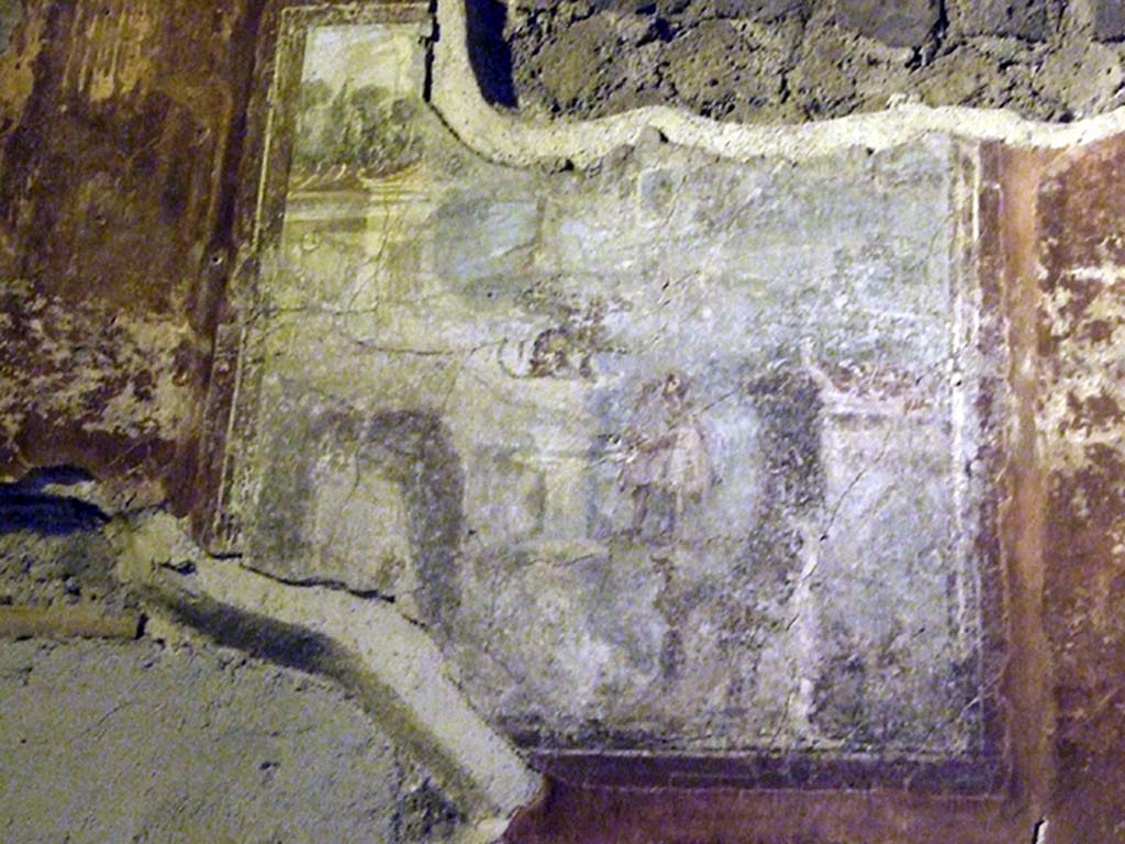 Villa San Marco, Stabiae, December 2006. Room 44.
Remains of wall painting at west end of north wall of atrium showing Oedipus and the Sphynx.
