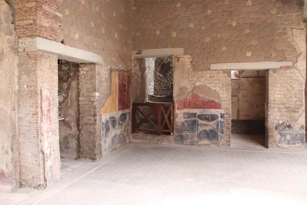 Villa San Marco, Stabiae, September 2019.  
Room 44, south-east corner of atrium, with corridor 59a on left, steps 55 to upper floor (centre left) and doorway to room 61 (on right). 
Photo courtesy of Klaus Heese.
