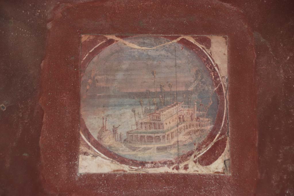 Villa San Marco, Stabiae. September 2019. Room 20, east wall, painted reproduction medallion of maritime villa. Photo courtesy of Klaus Heese.
(original now in Naples Archaeological Museum, inventory number 9409A.)
