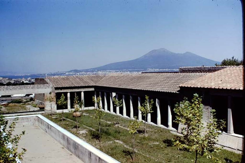 Villa San Marco, Stabiae, 1968. Looking north-east from nymphaeum across garden area and east portico towards Vesuvius. 
Photo by Stanley A. Jashemski.
Source: The Wilhelmina and Stanley A. Jashemski archive in the University of Maryland Library, Special Collections (See collection page) and made available under the Creative Commons Attribution-Non Commercial License v.4. See Licence and use details.
J68f1906
