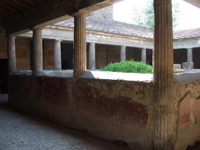 Villa of Mysteries, Pompeii. May 2006. Painted wall above doorway to room 33.