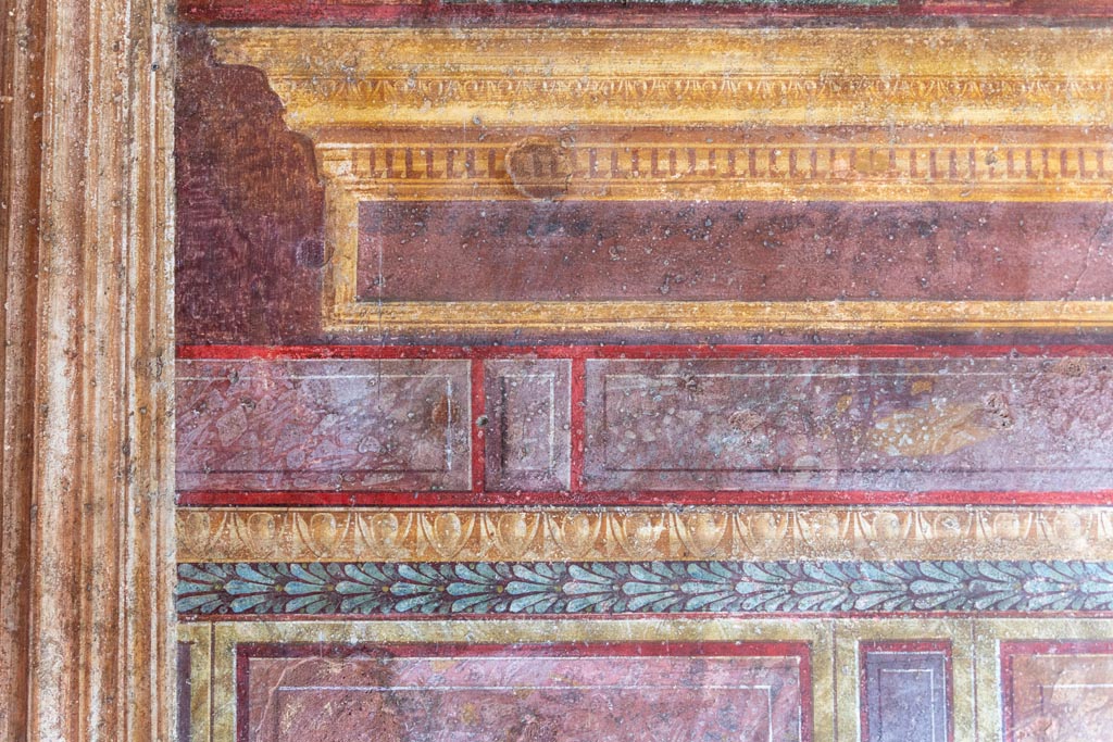 Villa of Mysteries, Pompeii. October 2023. Room 8, detail from south end of upper east wall. Photo courtesy of Johannes Eber.