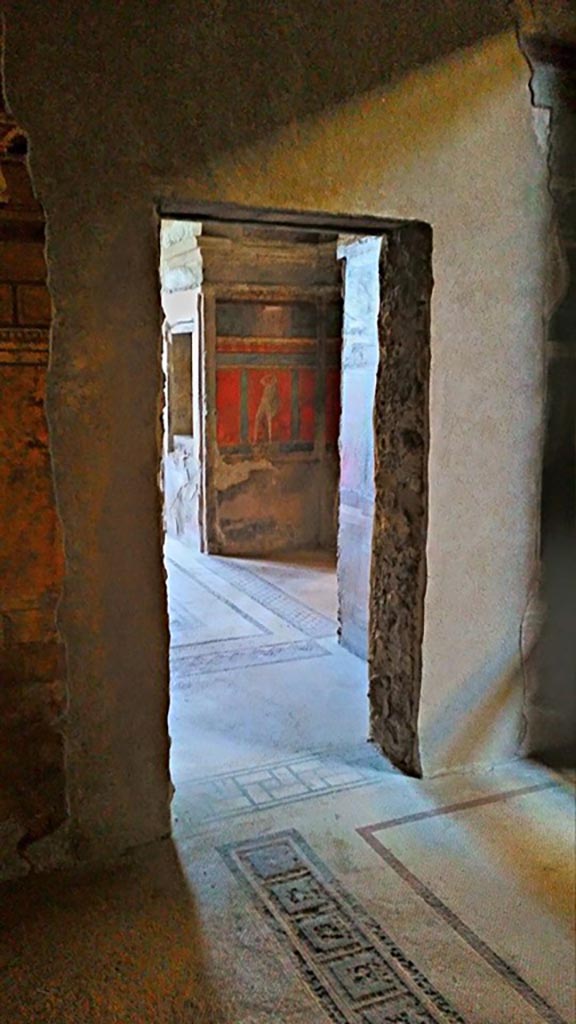 Villa of Mysteries, Pompeii. c.2015-2017.
Looking through doorway into room 4, looking towards north-west corner. Photo courtesy of Giuseppe Ciaramella.

