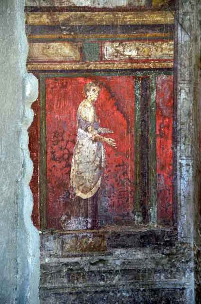 Villa of Mysteries, Pompeii. May 2010. Room 4, detail of wall painting of a priestess, on east wall.