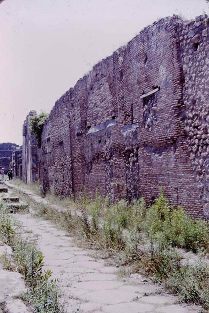 Via degli Augustali between VII.1 and VII.2, Pompeii. 1964. Looking west towards north side. Photo by Stanley A. Jashemski.
Source: The Wilhelmina and Stanley A. Jashemski archive in the University of Maryland Library, Special Collections (See collection page) and made available under the Creative Commons Attribution-Non Commercial License v.4. See Licence and use details.
J64f1071
