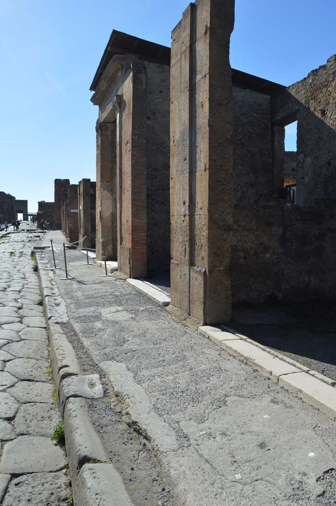 Via della Fortuna, Pompeii. March 2019. 
Looking west along pavement from VI.12.4, on right. 
Foto Taylor Lauritsen, ERC Grant 681269 DCOR.
