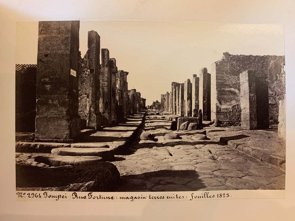 Via della Fortuna between VII.4 and VI.13, looking west. 
From an album of Michele Amodio dated 1874, entitled “Pompei, destroyed on 23 November 79, discovered in 1745”. 
Photo courtesy of Rick Bauer.
