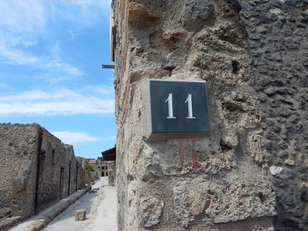 Via di Castricio, Pompeii. May 2017. Looking west from I.11.11. Photo courtesy of Buzz Ferebee.

