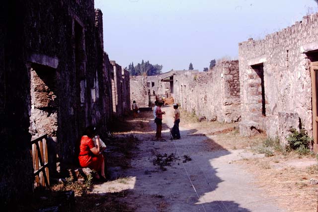 Via di Castricio, May 2010.  Looking north-east to the corner of I.13.11.