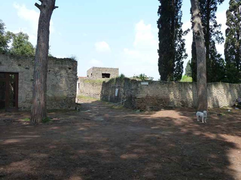 Via di Castricio, May 2010. Looking north-east towards the Vicolo di Giulia Felice, between II.3 and II.4.