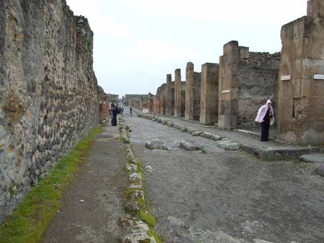 Via di Nola. South side at III.11. Looking east to Nola Gate. March 2009.