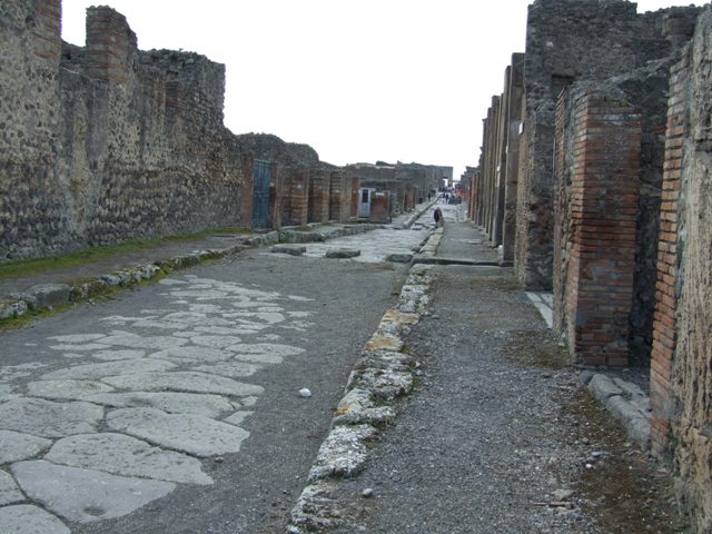 Via di Nola, south side, May 2010. Looking east along III.11.