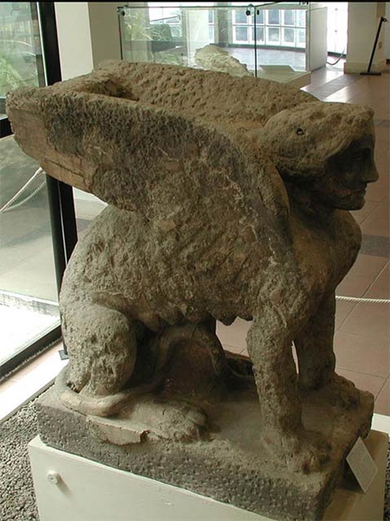 Monumento Funerario del Fondo Prisco. Statue of a seated sphinx with feline body, female head and large wings. The statue was found out of its original funerary context so we cannot be certain that it was attributable to this tomb. 