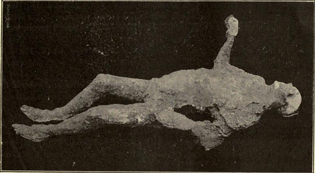 NGG Pompeii. Cast of a victim made in September 1908.
The body was found 6 metres east from the eastern extremity of the schola, towards the north-east.
On the right side where the plaster did not penetrate, the residue of a purse of rather coarse cloth was recovered.
It had contained the following objects:
-Two iron keys. 
-Cylindrical reliquary of silver with cover, containing a small pebble and the remains of an ointment of dark colour. 
-Small empty circular base, silver with moulding. 
-Seventeen bronze coins, of the Emperors Augustus, Claudius, Galba, Vespasian and Titus. 
-Forty-six silver coins, quite a lot of which were of M. Anthony, eleven of Vespasian, one of Titus and two of Domitian.
See Notizie degli Scavi di Antichità, 1910, p. 397, fig. 10.
