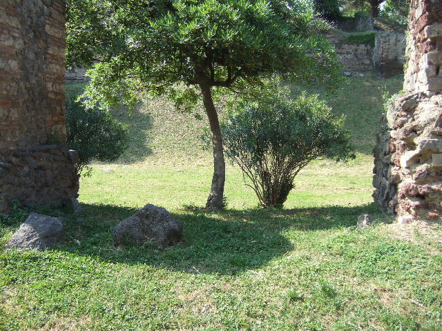 Pompeii Porta Nocera. May 2006. Side of Tomb 28EN and gap to tomb 30EN. Looking north. 