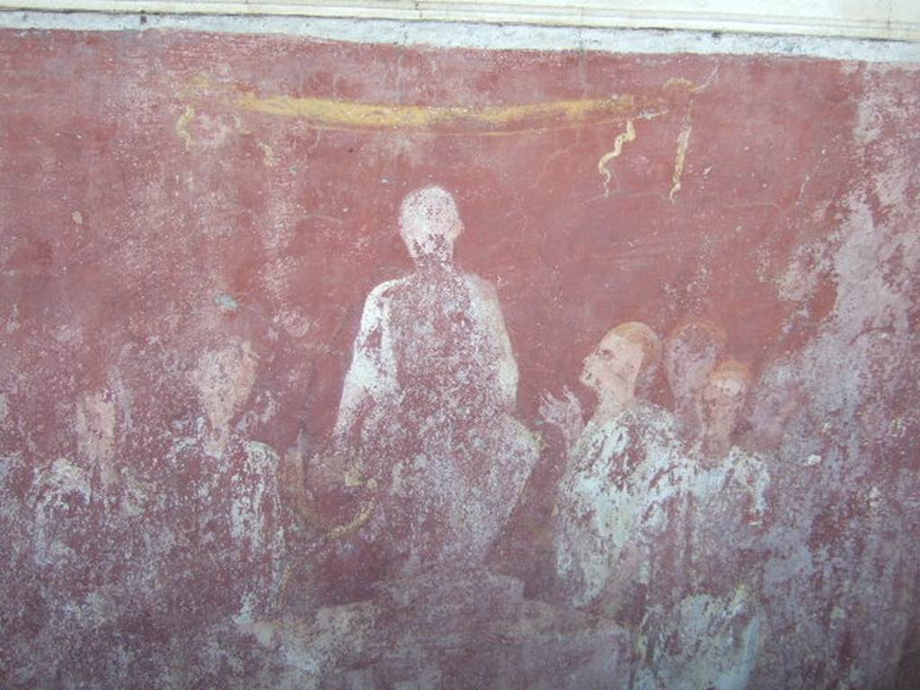 VGJ Pompeii.  May 2006.  Inner tomb east wall.  Painting of seated aedile. Engelmann describes this as “the young dignitary (aedilis) in his character of justiciary sitting on a podium;  around him several men, of which the one at his right devoutly looks up at him and lifts his right hand.” See Engelmann, W., 1929.  New Guide to Pompeii: Second Edition.  Engelmann. (p. 55).