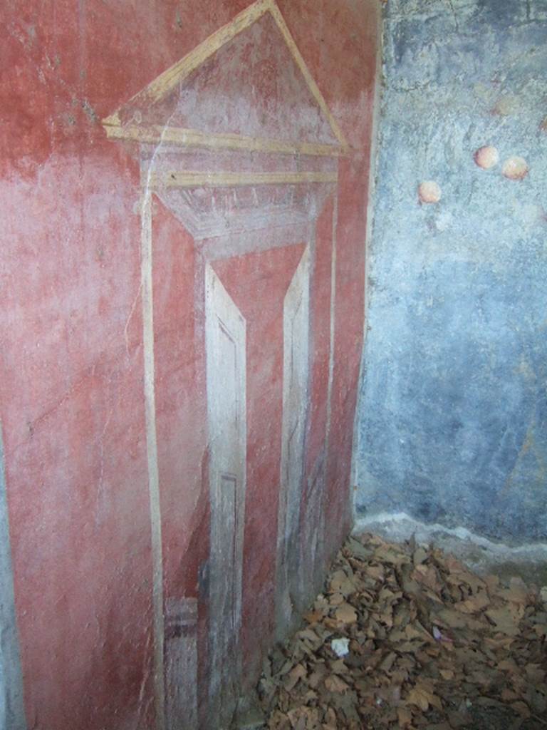 VGJ Pompeii. May 2006. West outer wall of tomb with painting of door leading out of tomb.