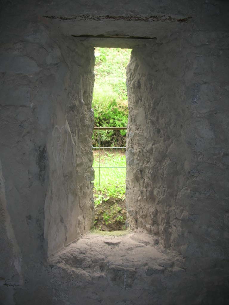 Tower XI, Pompeii. May 2010. 
Looking north through window on west end of north wall of lower floor room. Photo courtesy of Ivo van der Graaff.
