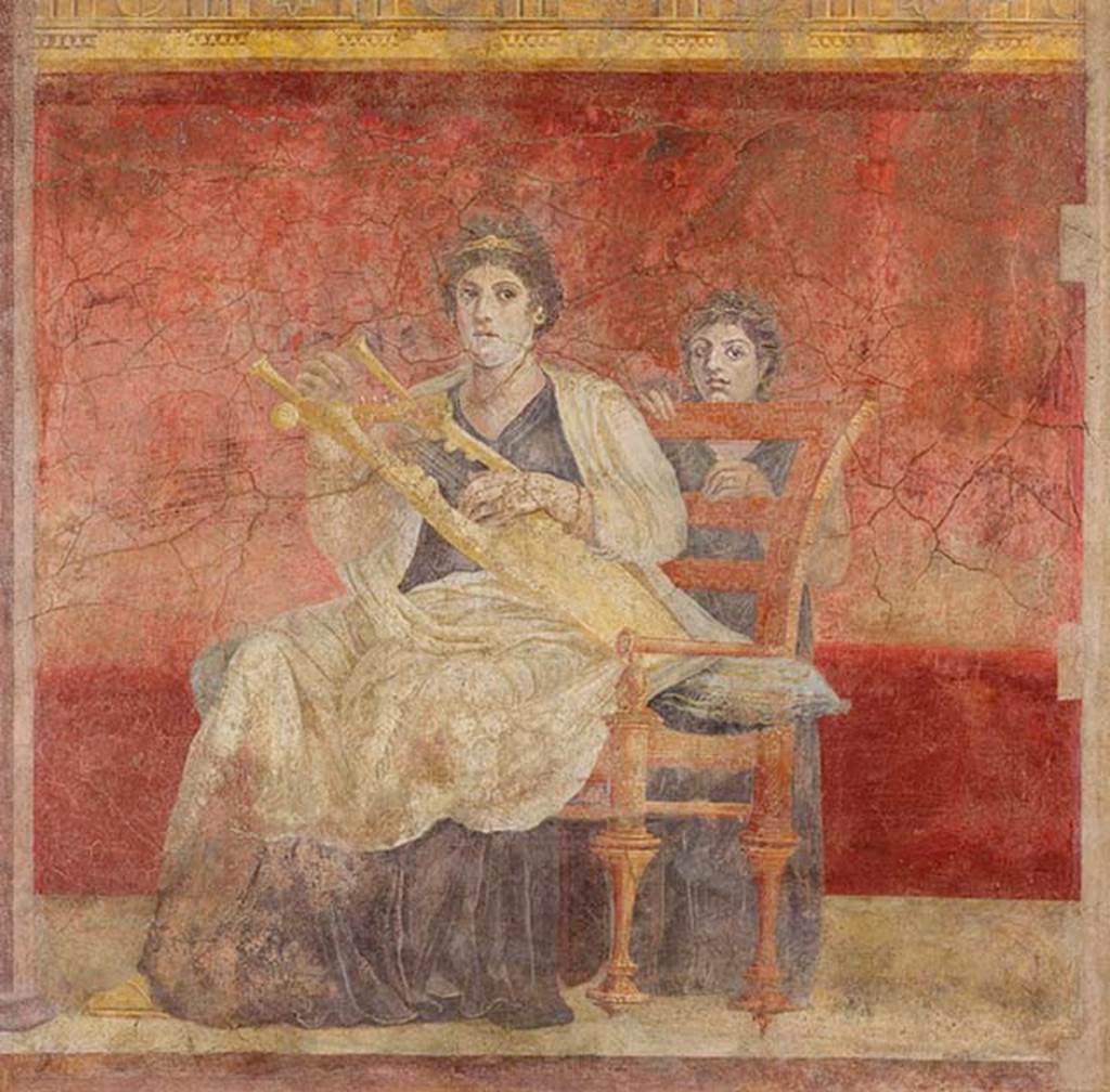 Villa of P Fannius Synistor at Boscoreale. Room H, triclinium or oecus, panel at north end of east wall. 
A seated woman in white and purple garments is playing a golden kithara. 
She and the young girl standing behind her chair looking towards the spectator or the entrance.
Photo  The Metropolitan Museum of Art, Rogers Fund 1903. Inventory number 03.14.5.
See www.metmuseum.org

On the east wall were three paintings.
At the left end was a seated woman wearing purple and white robes, playing a golden lyre. 
At the rear was another female figure, a young girl standing behind the chair.

In the central panel, a couple in conversation on a throne were painted. 
The woman leaning forward with her chin on her fist, gazing at the nude male figure at her side, whose crossed hands rested on a golden staff.
At the right end, was a female painted standing, turning her head upwards to gaze towards the wall with Venus. 
In her right hand, she held a shield which showed the reflection of a nude youth, also gazing towards the north wall and Venus.
