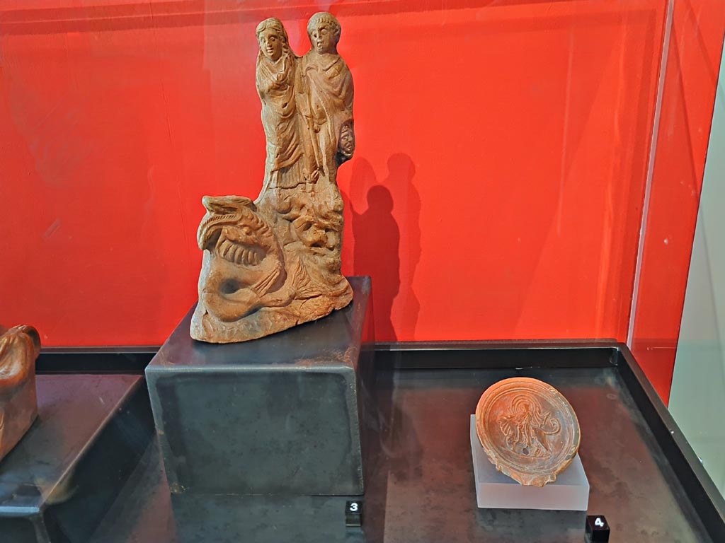 L’edificio B di Murecine a Pompei. March 2024. Photo courtesy of Giuseppe Ciaramella.
No.3. Group of Perseus, Andromeda and the sea monster (Ist century AD). (Gruppo con Perseo, Andromeda e il mostro marino (I sec, d.C). 
On display in exhibition in Palaestra entitled – “L’altra Pompei, vite comuni all’ombra del Vesuvio”.
