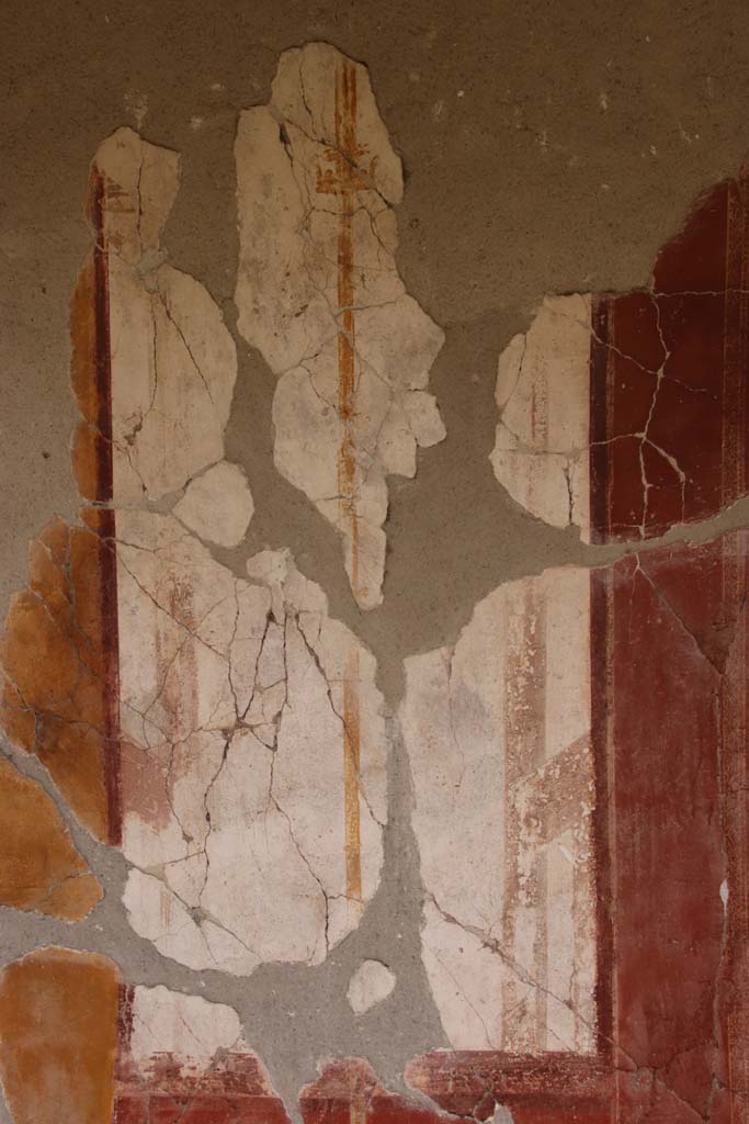 Oplontis Villa of Poppea, October 2020. 
East Portico 34, white painted panel with golden candelabra.Photo courtesy of Klaus Heese. 
