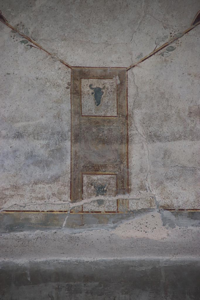 Villa of Poppaea, Oplontis, October 2023. 
Area 60, detail of painted decoration from west portico wall, above the doorway to room 72, in centre. 
Photo courtesy of Klaus Heese. 

