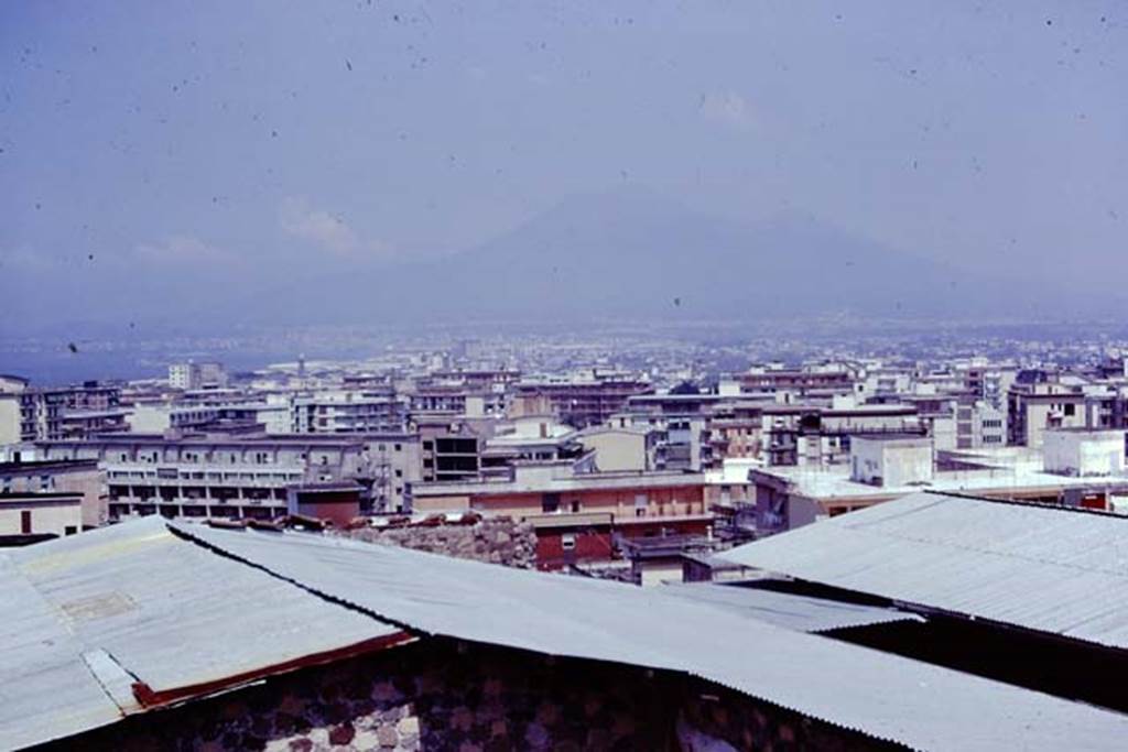 Looking north towards Vesuvius across Castellammare di Stabia, from the ridge of Varano. 1976. Photo by Stanley A. Jashemski.   
Source: The Wilhelmina and Stanley A. Jashemski archive in the University of Maryland Library, Special Collections (See collection page) and made available under the Creative Commons Attribution-Non Commercial License v.4. See Licence and use details. J76f0510
