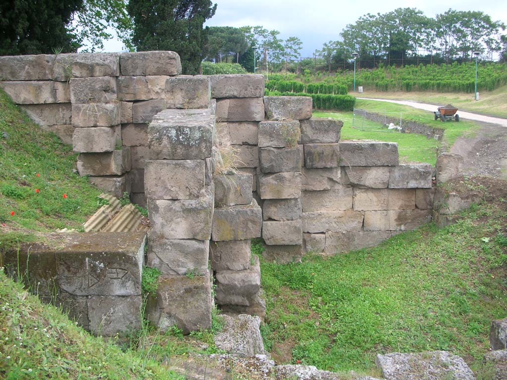 Vesuvian Gate, Pompeii. May 2010. 
Looking north towards city wall on north side of Gate. Note the Mason’s marks, lower left. Photo courtesy of Ivo van der Graaff.
