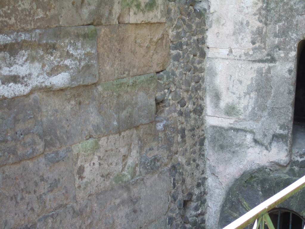 Vesuvian Gate Pompeii. May 2006. Wall to left of Tower X showing impact by war machines used by Sulla. 