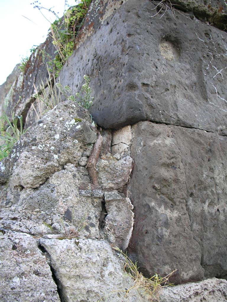 Vesuvian Gate, Pompeii. May 2010. 
Detail of missile indentation from war machines of Sulla, on west side of Gate at north end. Photo courtesy of Ivo van der Graaff.

