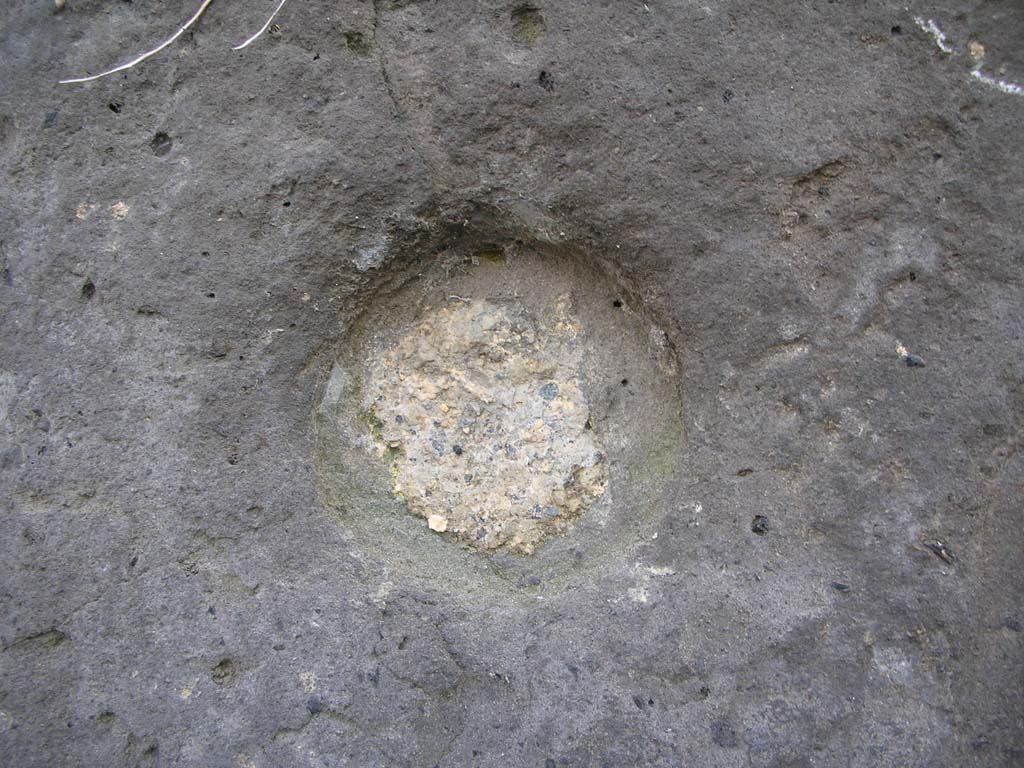 Vesuvian Gate, Pompeii. May 2010. Detail of missile indentation at north-west corner of gate. Photo courtesy of Ivo van der Graaff.

