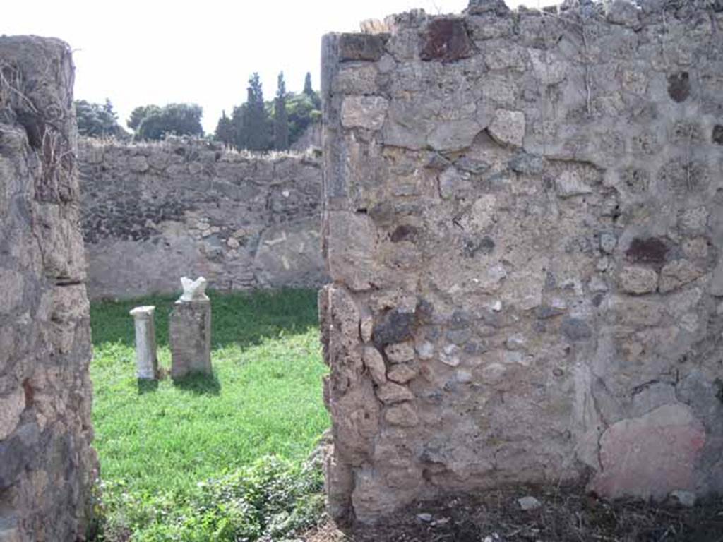 I.2.17 Pompeii. September 2010. Looking west through doorway of room 4, into atrium. Photo courtesy of Drew Baker.
