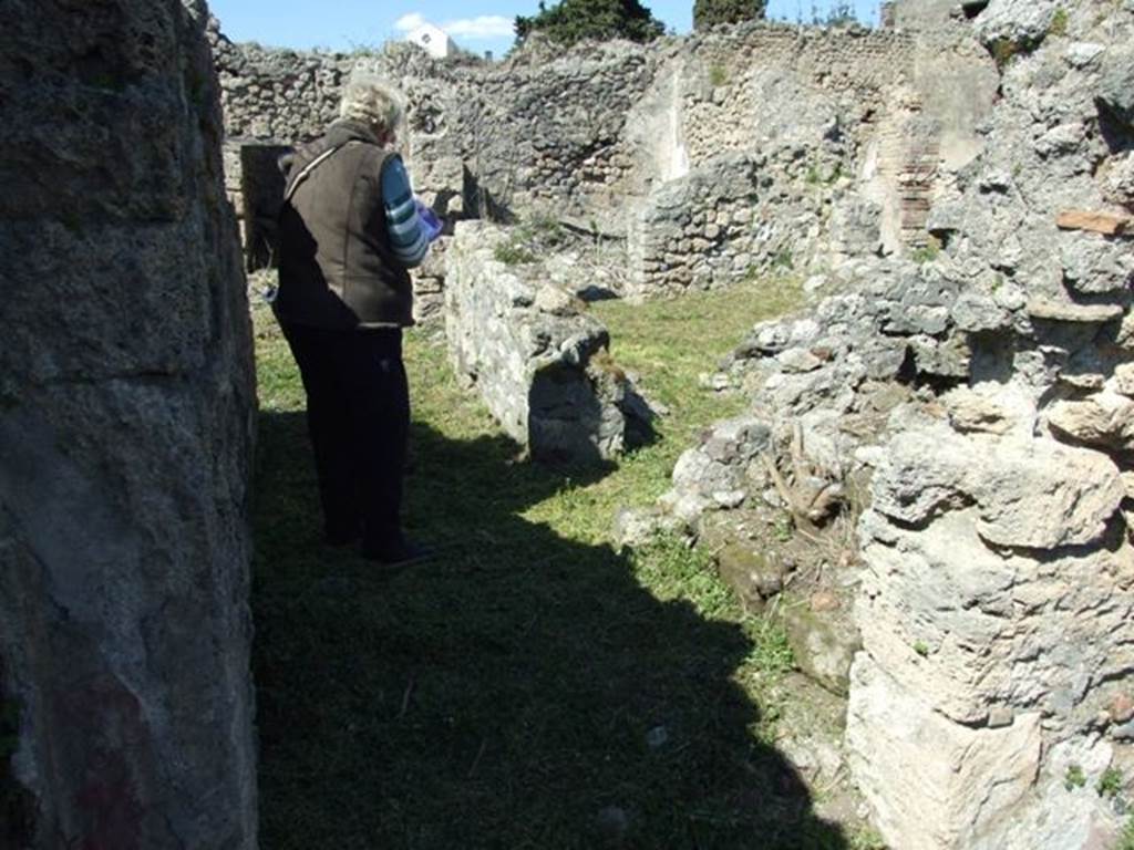 I.2.17 Pompeii.  March 2009.  Looking north from Triclinium, to corridor on south east side of Atrium. Also doorway to Room 11.