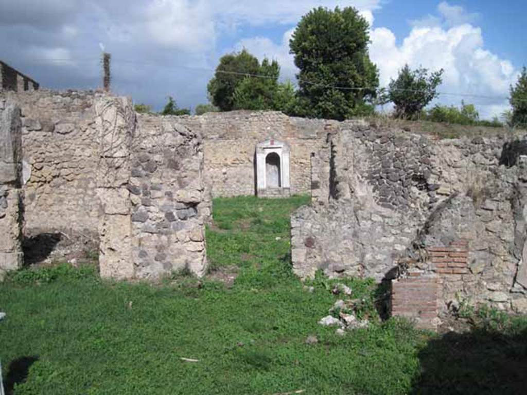 I.2.17 Pompeii. September 2010. Looking east from atrium, towards doorway to room 12, looking into room 13. Photo courtesy of Drew Baker.
