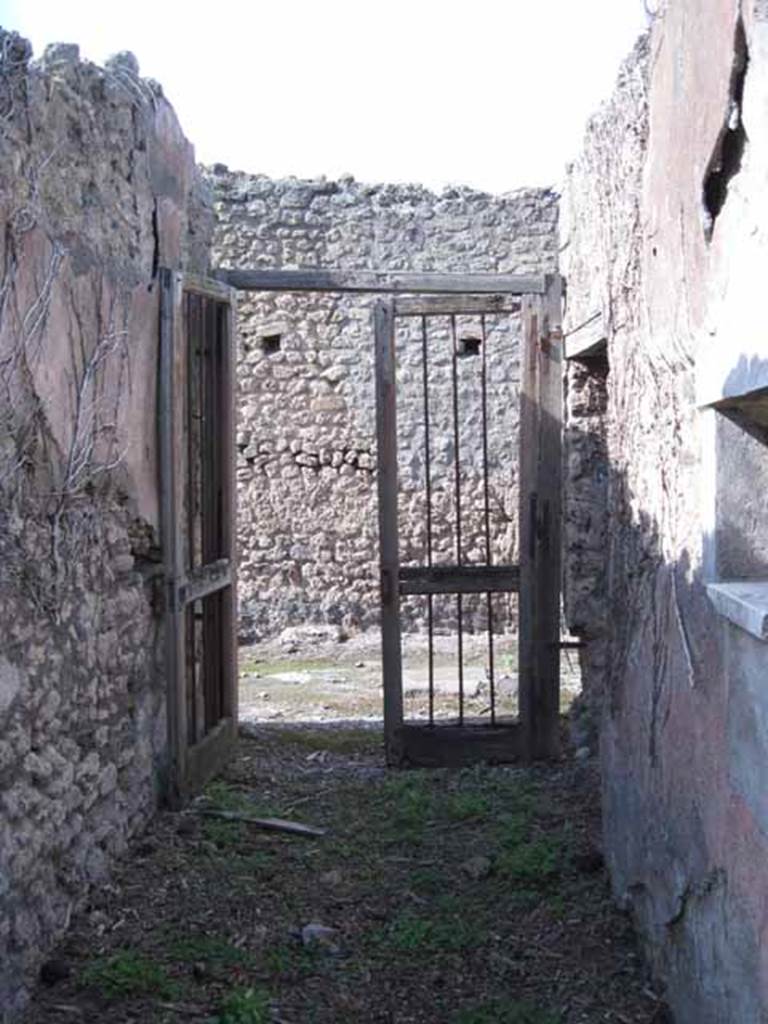 I.2.17 Pompeii. September 2010. Entrance corridor, looking north onto unnamed vicolo. Photo courtesy of Drew Baker.
