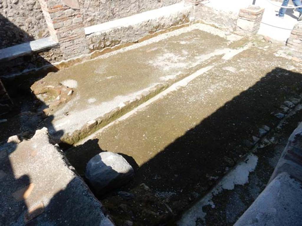 I.6.7 Pompeii. May 2016. Looking north-west across garden area with remains of plaster at base of garden wall. Photo courtesy of Buzz Ferebee.