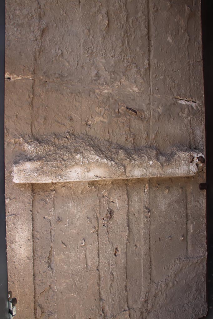 I.6.15 Pompeii. October 2023. Detail of plaster-cast of door. Photo courtesy of Klaus Heese.