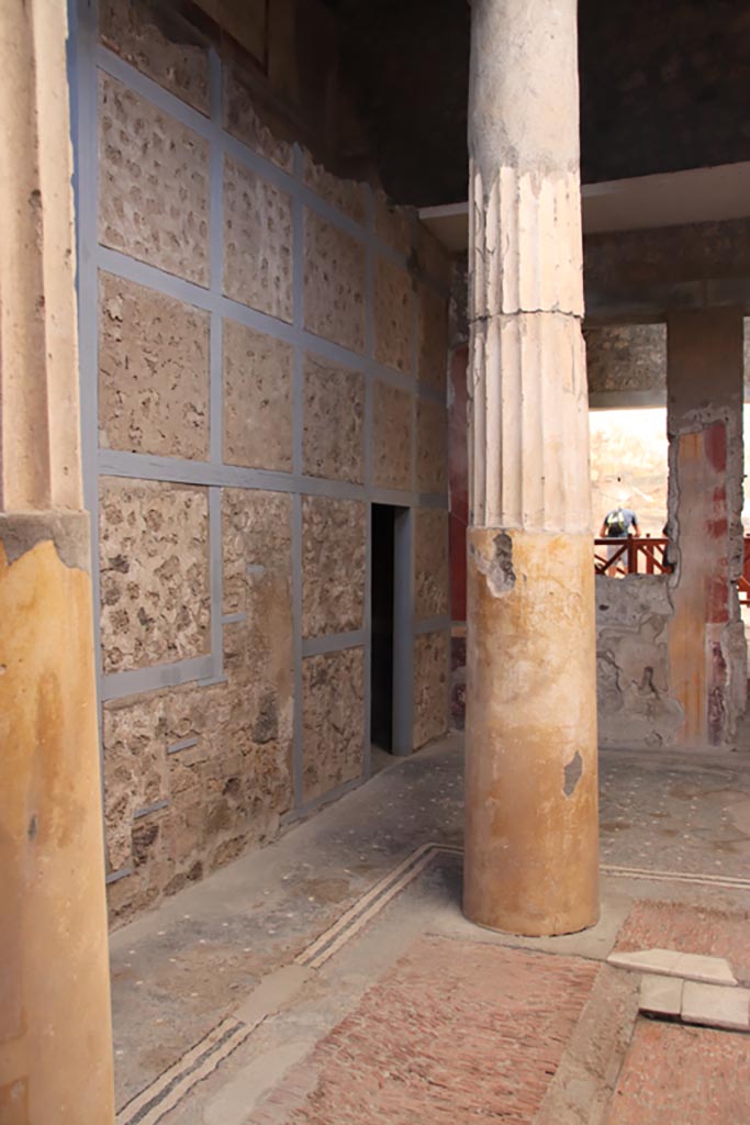 I.6.15 Pompeii. October 2023.
Room 4, looking north across west side of impluvium in atrium towards doorway to room 5.
Photo courtesy of Klaus Heese.
