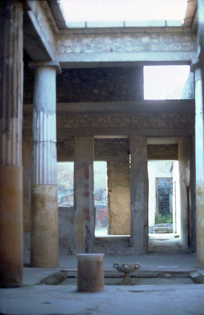 I.6.15 Pompeii, 1971. Room 4, looking north across tetrastyle atrium towards garden area.  
Photo courtesy of Rick Bauer, from Dr George Fay’s slides collection.
