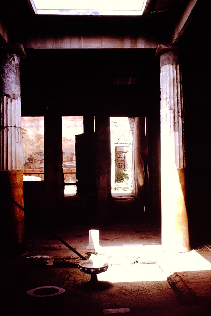 I.6.15 Pompeii. 1961. 
Room 4, looking north across tetrastyle atrium towards garden area. Photo by Stanley A. Jashemski.
Source: The Wilhelmina and Stanley A. Jashemski archive in the University of Maryland Library, Special Collections (See collection page) and made available under the Creative Commons Attribution-Non-Commercial License v.4. See Licence and use details.
J61f0346
