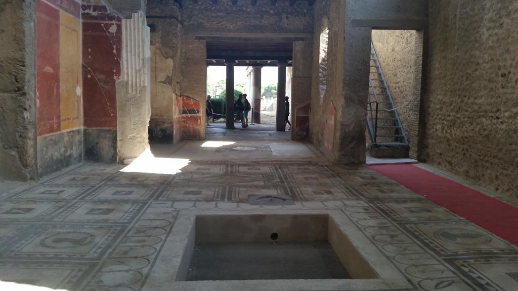 I.7.1 Pompeii. August 2016. 
Looking south across impluvium in atrium, towards tablinum, oecus and peristyle. Photo courtesy of Maribel Velasco.
