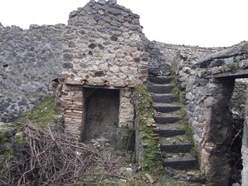 I.8.18 Pompeii. December 2007. Remains of a two sided staircase with small room underneath.