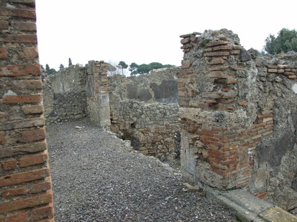 I.9.1 Pompeii. March 2009. Peristyle 13, south end of peristyle, with drop down to workshop complex below.