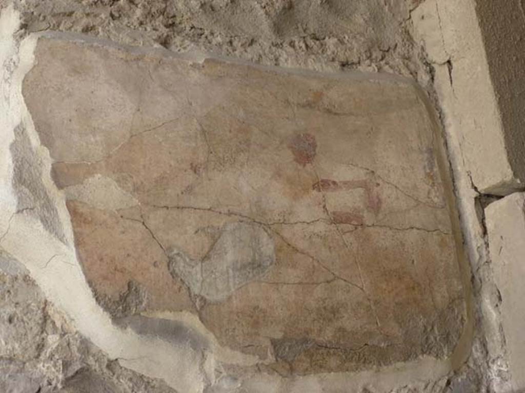 1.9.1 Pompeii. June 2012. East wall of vestibule, with remains of wall painting of Mercury and Hercules. 
Hercules stands to the left and in the right of the painting is Mercury 
Photo courtesy of Michael Binns.
