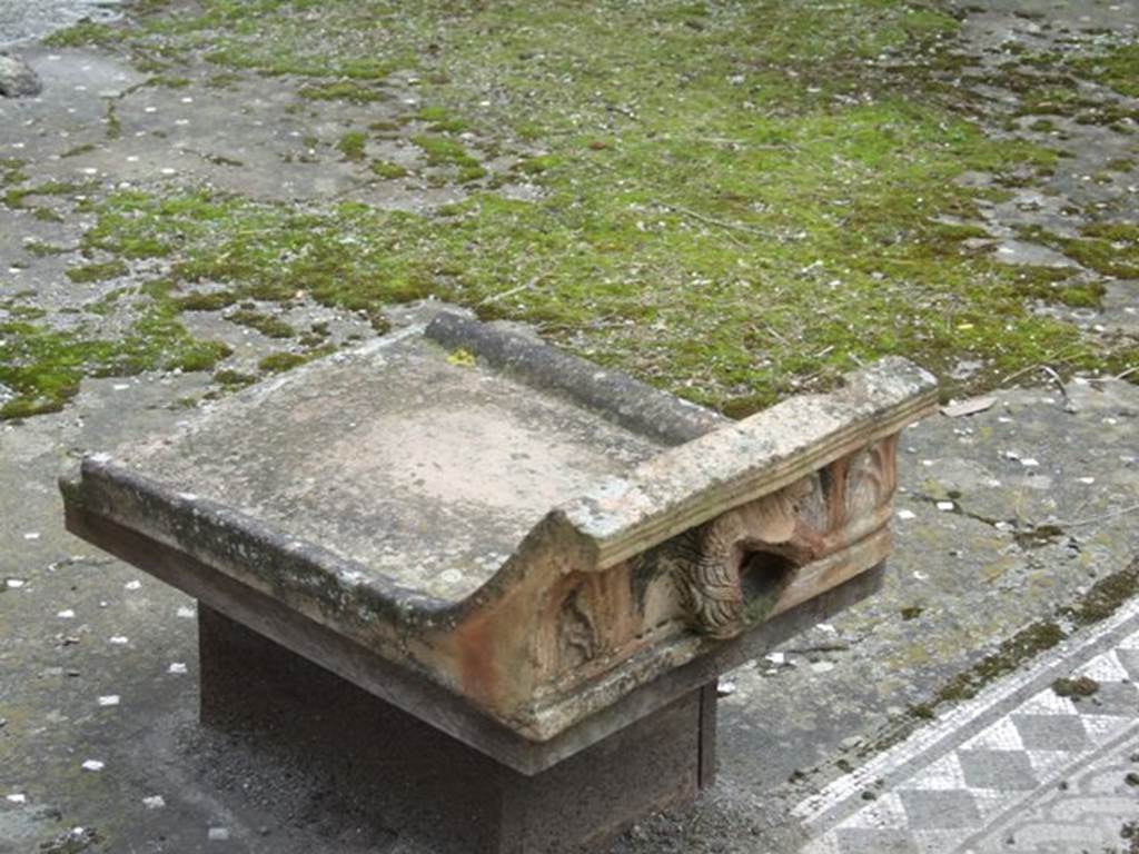 I.9.1 Pompeii. March 2009. Room 2, atrium. Grondaia or Antefisse fittili or waterspout from compluvium.